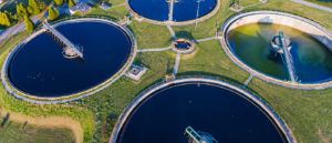 Pace Analytical PFAS Analysis. Birds eye view of Modern industrial sewage treatment plant.